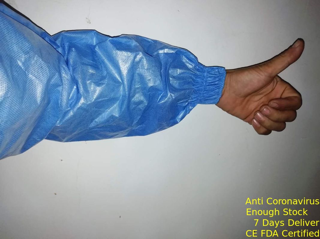 Il braccio eliminabile tessuto non di Sms collega impermeabile con un manicotto con il polsino Elasticized extra fornitore